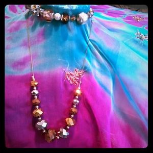 Necklace and stretch bracelet